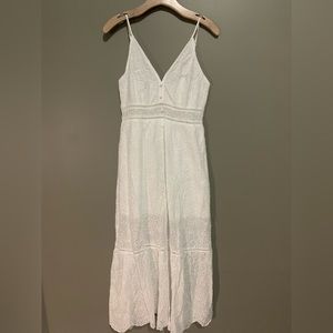 Crochet lace maxi dress with front slit.